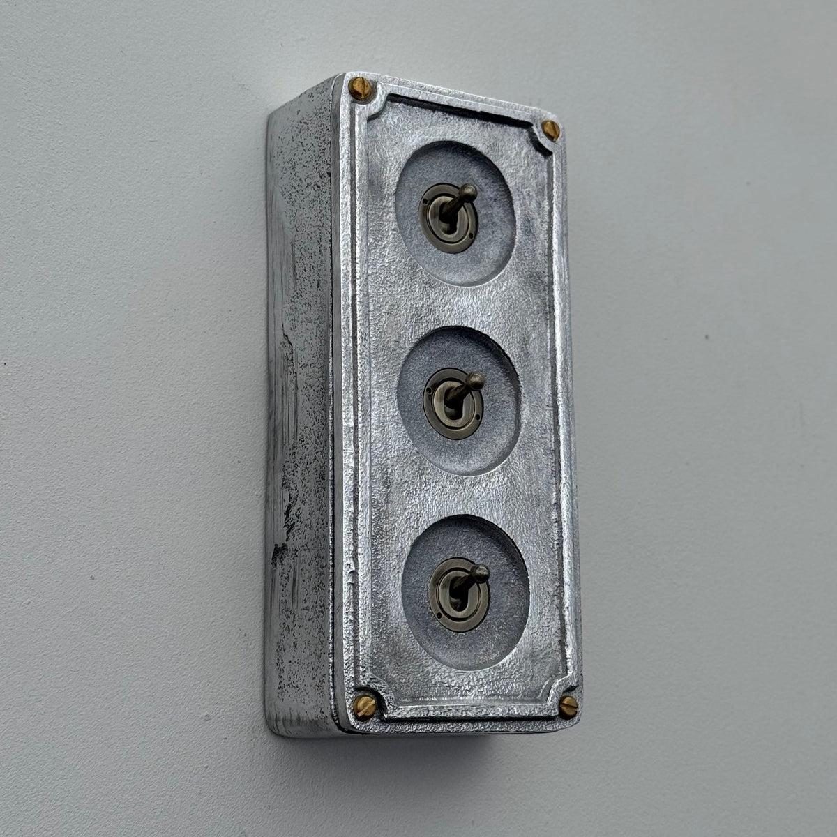 Brassvane 3 gang conduit toggle switch overall view