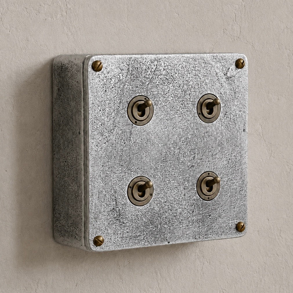 Brassvane 4 gang conduit light switch overall view