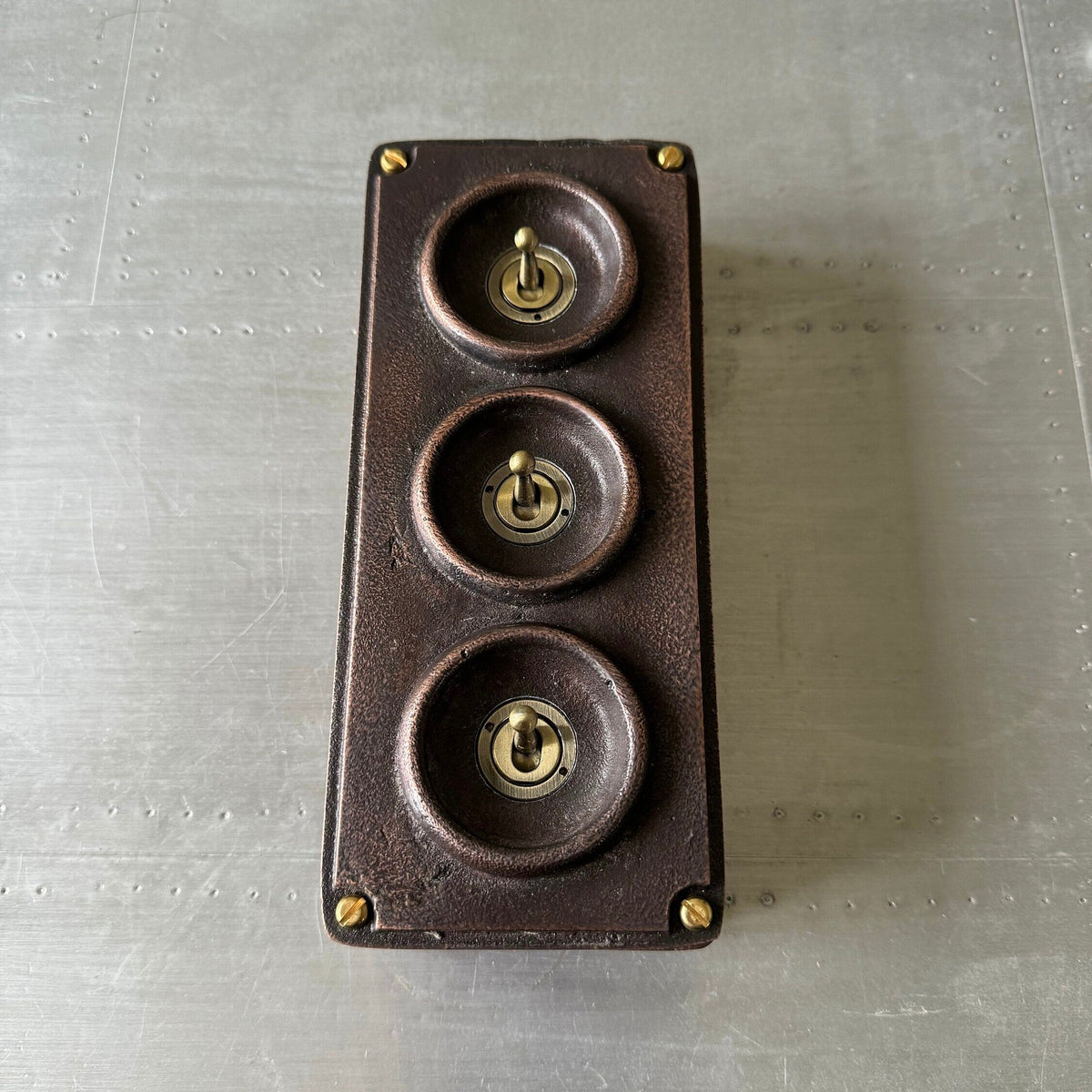 Brassvane 3 gang conduit light switch additional view 3