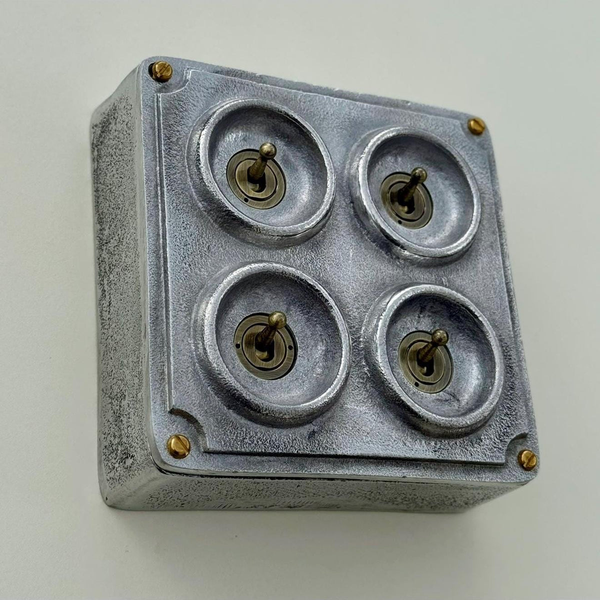 Brassvane 4 gang conduit light switch additional view 3
