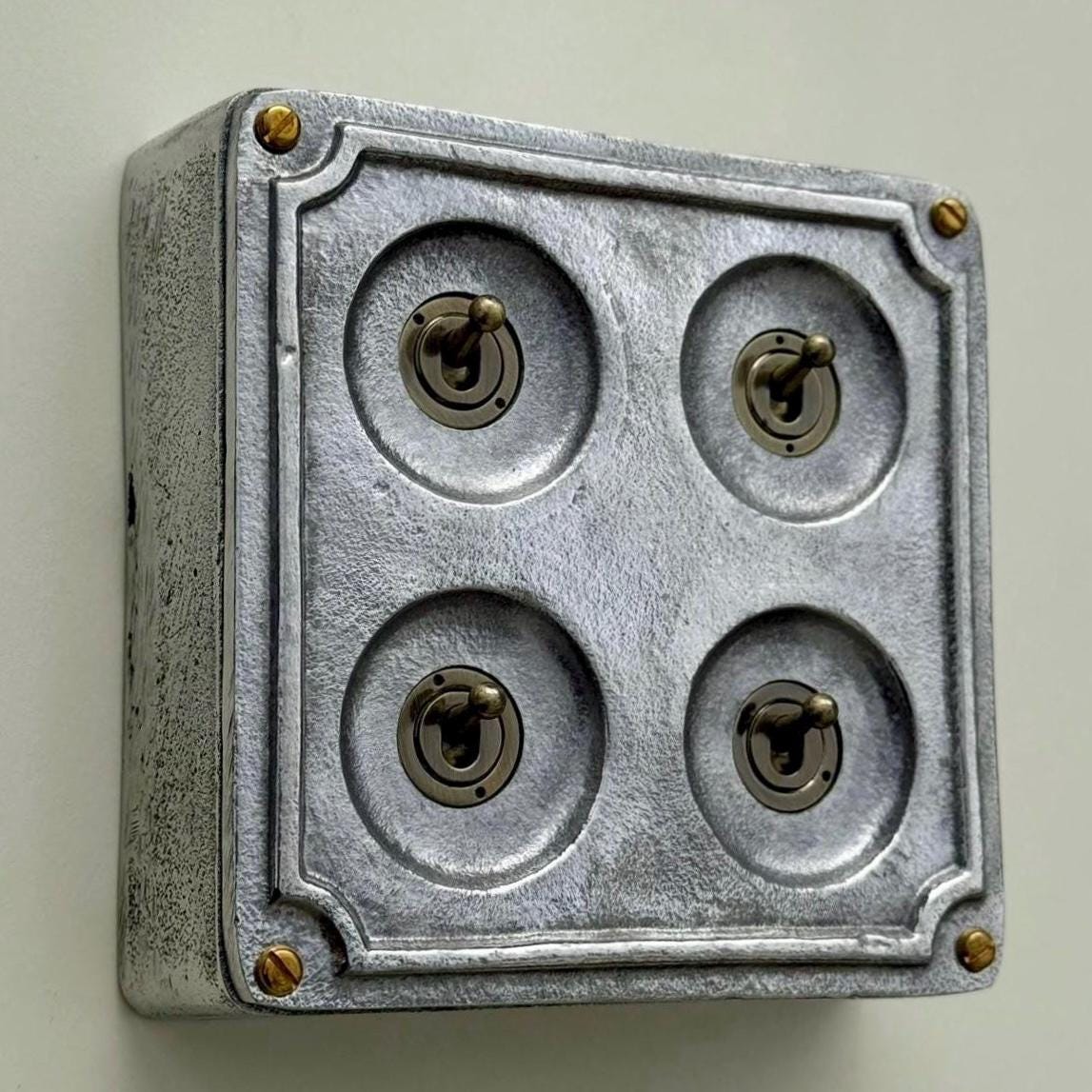 Brassvane 4 gang conduit toggle switch overall view